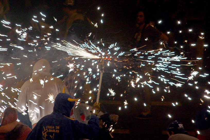 A Catalan Diable, mesmerizing a crowd at a Correfoc