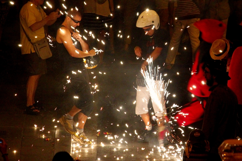 Spectators joining in the Correfocs