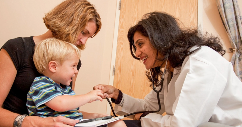 Pediatrician making a home visit