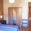 Dormitorio con aire acondicionado