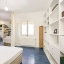 Dormitorio separado por cortina