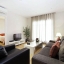 Living room and entrance to bedroom