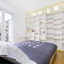 Well-lit master bedroom with window shutters
