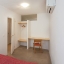 Habitación doble con mesa de trabajo