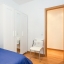 Tweepersoons slaapkamer met garderobe