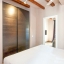 Slaapkamer met houten balken