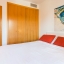 Air-conditioned master bedroom with wardrobe