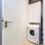 Utility room with washing machine