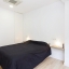 Dormitorio con aire acondicionado
