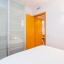 Bedroom with air-conditioning and wardrobe