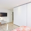 Spacious bedroom with TV