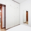 Dormitorio con baulera